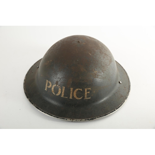 169 - 1939-45 A World War II Police brodie helmet, the black shell stencilled 'Police'.