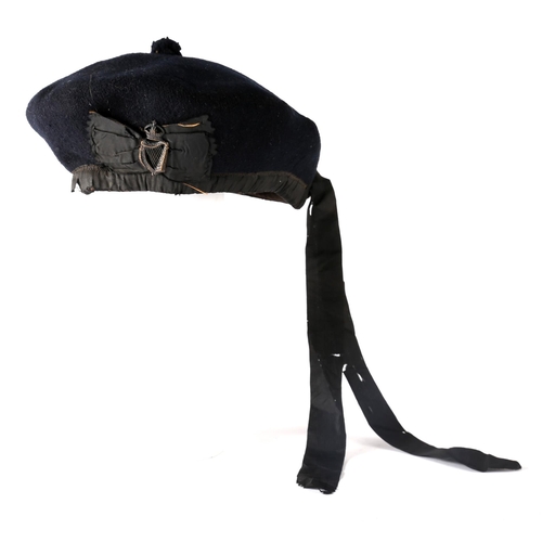 104 - Auxiliary Division, Royal Irish Constabulary Tam o' Shanter cap. A navy-blue Tam o' Shanter with Roy... 