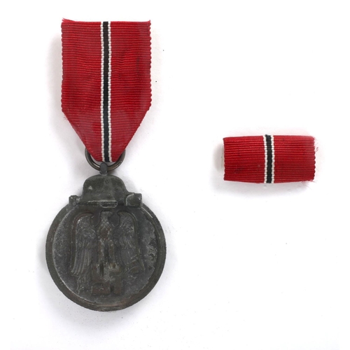 134 - 1939-45 German and Soviet medals. Eastern Front Medal, with certificate of issue (5 August 1942) to ... 