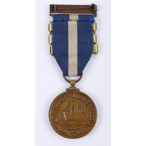 143 - 1939-1946 Merchant Marine medal, with three bars, box of issue and compliment slip. To an unknown re... 