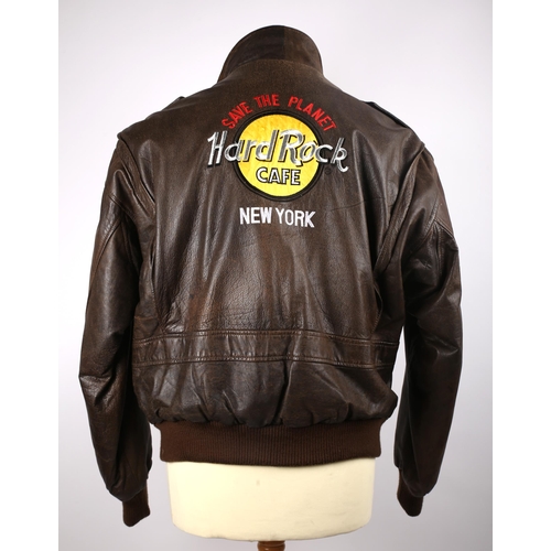 223 - Hard Rock Cafe, New York, 1980s-90s, branded brown leather bomber jacket, the back embroidered with ... 