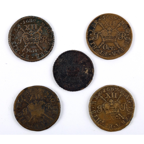 254 - Coins, Ireland James II gunmoney. Four large shillings, 1689, Augt., Oct:, Dec:, Mar:, also a weakly... 