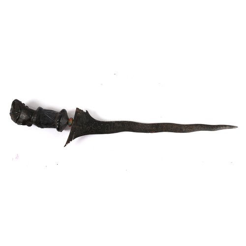 205A - An Indonesian kris, the wavy blade with attractive pamor pattern, the hilt and sheath of ornately ca... 