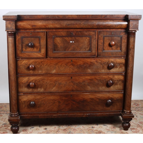86 - A VICTORIAN MAHOGANY SCOTCH CHEST of inverted breakfront outline the shaped top above one long three... 