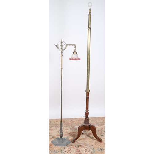90 - A VICTORIAN BRASS FLOOR STANDING LAMP the cylindrical and reeded column with pierced C-scroll finial... 