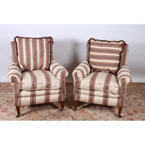 13 - A PAIR OF MAHOGANY AND STRIPED UPHOLSTERED EASY CHAIRS with loose cushions on square tapering legs w... 