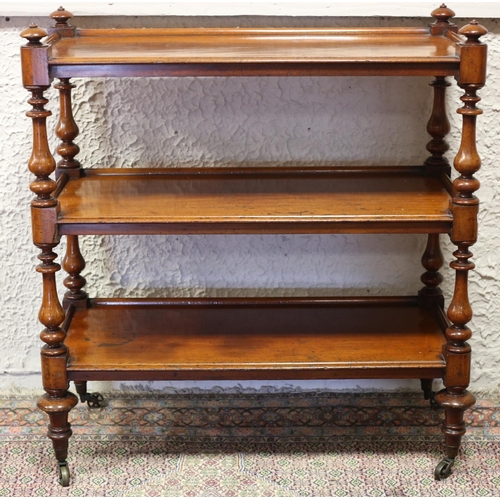 20 - A VICTORIAN MAHOGANY THREE TIER DUMB WAITER of rectangular outline with moulded gallery raised on ba... 