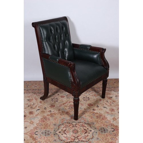 29 - A REGENCY DESIGN MAHOGANY AND UPHOLSTERED LIBRARY CHAIR the reeded frame with button upholstered bac... 