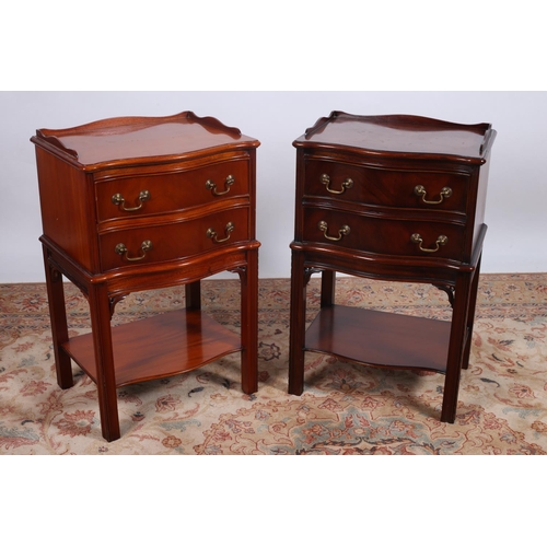 37 - A PAIR OF GEORGIAN DESIGN MAHOGANY CHESTS each of serpentine outline with moulded three quarter gall... 