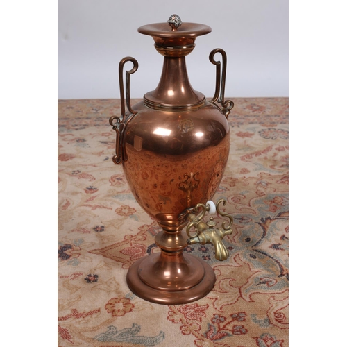 48 - A VICTORIAN COPPER AND BRASS SAMOVAR of urn form with scroll handles above a circular spreading foot... 
