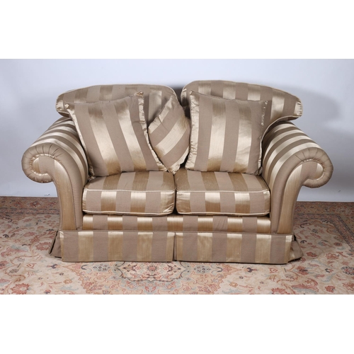 66 - A VICTORIAN STYLE SETTEE with striped upholstery and loose cushions with scroll over arms 82cm (h) x... 