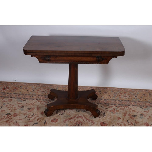 70 - A GOOD 19TH CENTURY ROSEWOOD FOLD OVER CARD TABLE the rectangular hinged top with baize lined interi... 