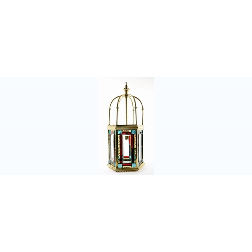 24 - A GOOD BRASS LEAD GLASS AND COLOURED GLASS SINGLE LIGHT LANTERN of octagonal outline 60cm (h) x 25cm... 
