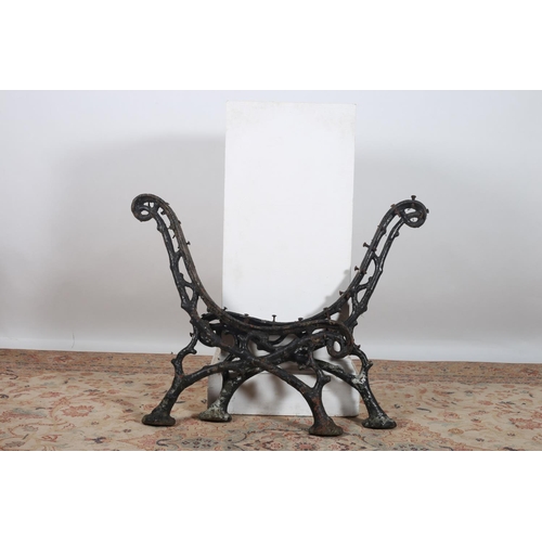 43 - TWO PAIRS OF 19TH CENTURY CAST IRON BENCH ENDS with rustic decoration on pad feet  each 73cm (h)