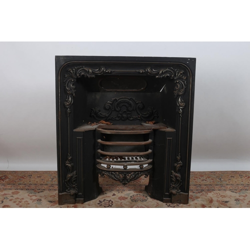 480 - A 19TH CENTURY CAST IRON FIRE INSET with foliate decoration and demilune fire basket 92cm (h) x 81cm... 