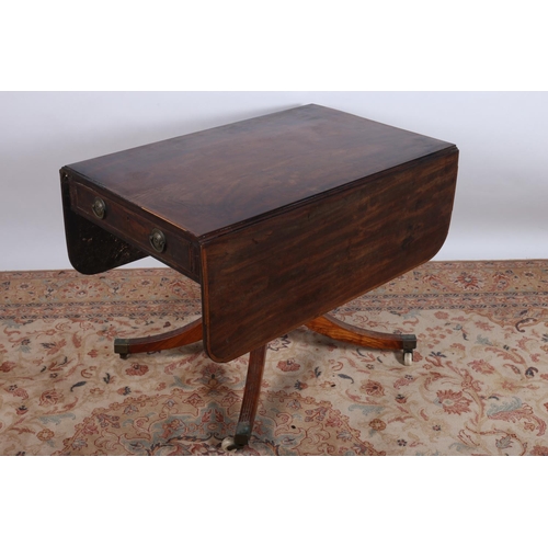 482 - A GEORGIAN MAHOGANY AND SATINWOOD CROSS BANDED DROP LEAF TABLE the rectangular hinged top with friez... 