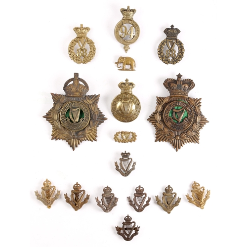 257 - Connaught Rangers, Victorian and Edwardian other Rank's helmet plates, two 88th Regiment badges, 94t... 