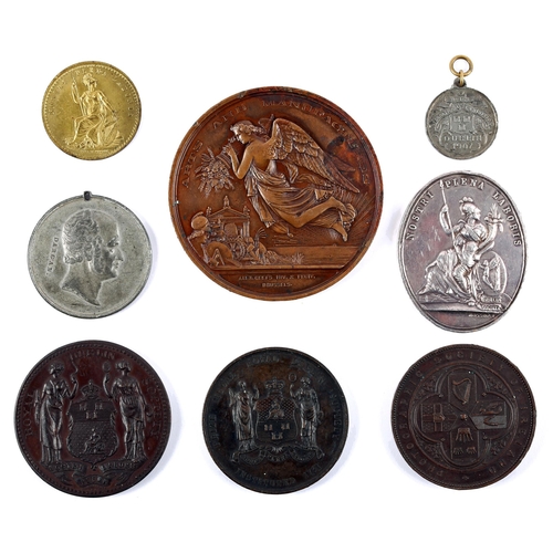 32 - Irish exhibition medals. An 1865 Dublin International Exhibition bronze award medal awarded to E. Wi... 