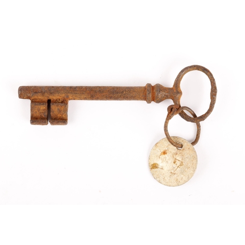 88 - Kilmainham Gaol cell key. A Victorian key with white metal disk attached numbered '27'. One of a num... 