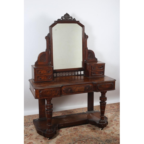 11 - LATE VICTORIAN WALNUT AND MAHOGANY DRESSING TABLE the superstructure with swivel mirror flanked by f... 