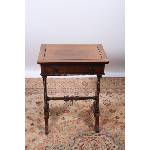 24 - A REGENCY DESIGN MAHOGANY OCCASIONAL TABLE of rectangular outline with frieze drawer raised on stand... 