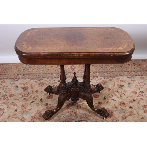 26 - A FINE 19TH CENTURY WALNUT AND MARQUETRY FOLD OVER CARD TABLE the oval hinged top containing a baize... 