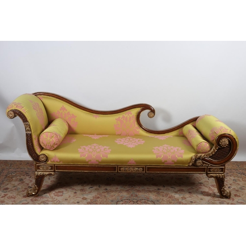 4 - A REGENCY DESIGN WALNUT AND PARCEL GILT SETTEE the shaped back with upholstered panel and seat and s... 