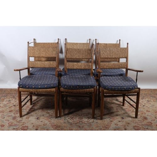 52 - A SET OF TWO VINTAGE HARDWOOD AND RUSH SEAT ELBOW CHAIRS