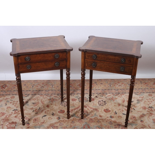 56 - A PAIR OF WALNUT CROSS BANDED LAMP TABLES each of rectangular outline with eared corners above two f... 
