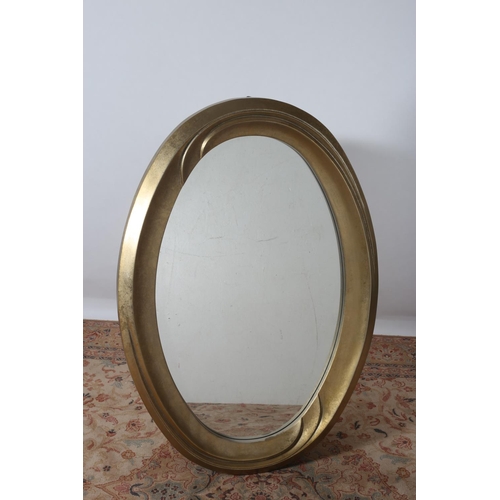 585 - A MODERN GILT FRAME MIRROR the oval plate within a moulded frame 127cm x 87cm