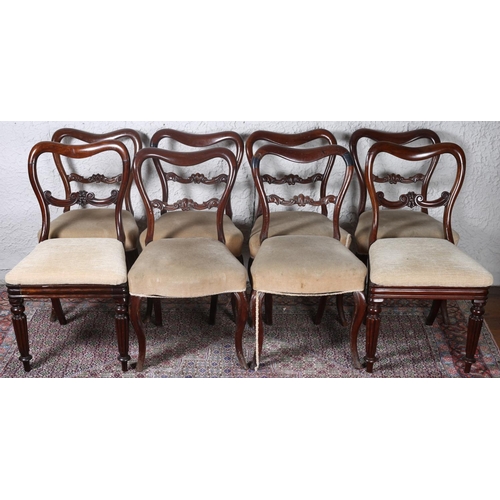 604 - A HARLEQUIN SET OF EIGHT VICTORIAN MAHOGANY DINING CHAIRS each with a curved top rail and splat with... 