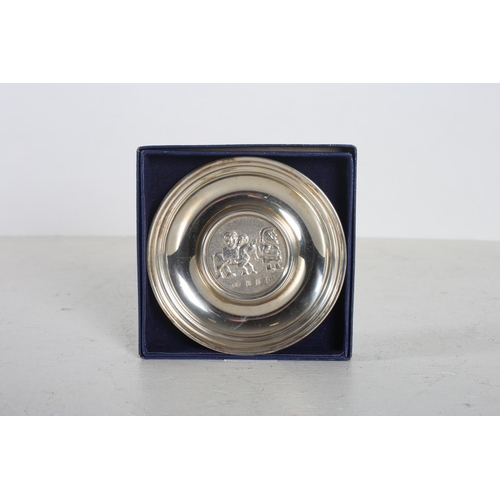 607 - AN IRISH SILVER CHRISTMAS PLATE Dublin circa 1975 of circular form Chased with scene flight into Egy... 