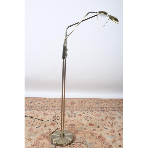 63 - A BRASS OXIDISED TWO BRANCH ADJUSTABLE FLOOR STANDING READING LAMP 80cm (h)