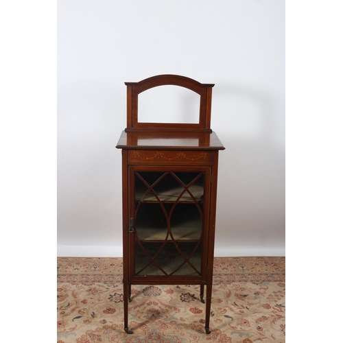 7 - AN EDWARDIAN MAHOGANY AND SATINWOOD INLAID DISPLAY CABINET the rectangular arched back (lacking mirr... 