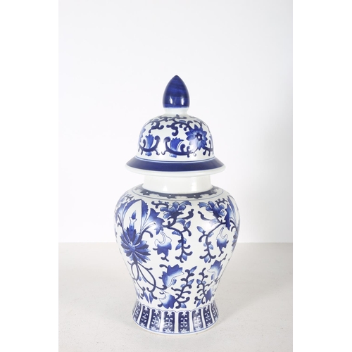 102 - AN ORIENTAL BLUE AND WHITE LIDDED GINGER JAR the blue and white ground decorated with stylized flowe... 