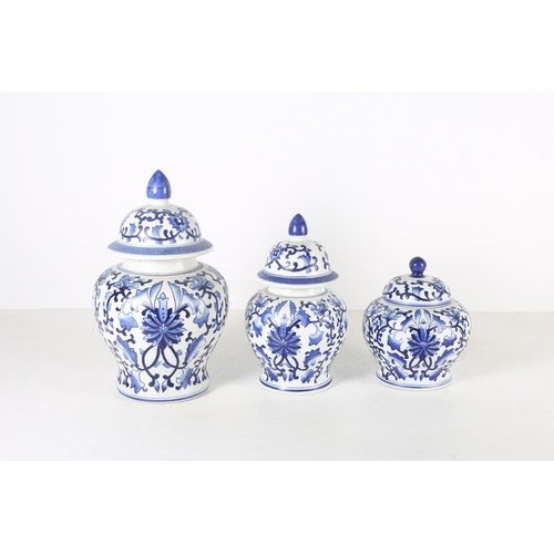 102 - AN ORIENTAL BLUE AND WHITE LIDDED GINGER JAR the blue and white ground decorated with stylized flowe... 