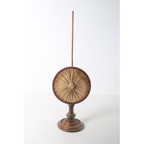 106 - A 19TH CENTURY MAHOGANY ADJUSTABLE TABLE SCREEN of oval outline with pleated panel raised on a circu... 