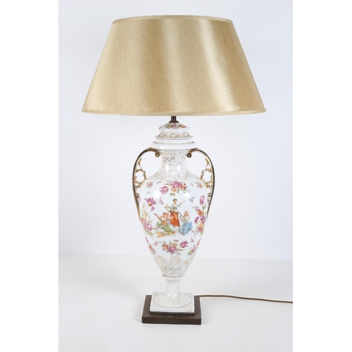 109 - A CONTINENTAL PORCELAIN TABLE LAMP of vase form the white and gilt ground with painted panel depicti... 