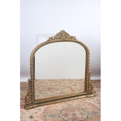 116 - A CONTINENTAL GILT FRAME MIRROR the rectangular arched plate within a moulded frame with flowerhead ... 