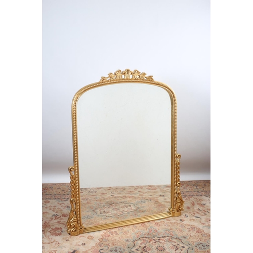 117 - A CONTINENTAL GILT FRAME MIRROR the rectangular arched bevellled glass plate within a beadwork frame... 