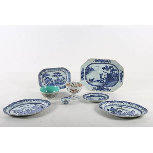 576 - FIVE ORIENTAL BLUE AND WHITE PLATES together with an oriental tazza the white ground with pink flora... 