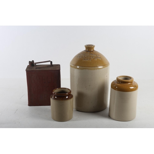 582 - A SHELL MOTOR SPIRIT OIL CAN with brass screw cap together with an earthenware whisky jar inscribed ... 