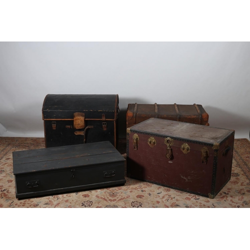 602 - A LEATHER BOUND AND CANVAS BOUND CABIN TRUNK together with a pine painted trunk and a canvas bound t... 