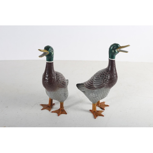 619 - A PAIR OF CAST METAL AND POLYCHROME FIGURES each modelled as a duck shown standing 40cm (h)