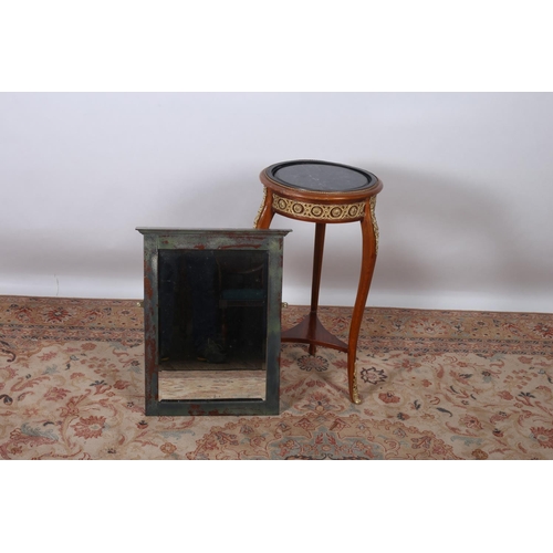 640 - A CONTINENTAL BEECHWOOD AND BRASS MOUNTED TABLE of circular outline with veined marble inset raised ... 