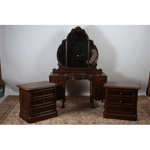 644 - A CONTINENTAL MAHOGANY DRESSING TABLE the superstructure with shaped mirrors within a moulded frame ... 