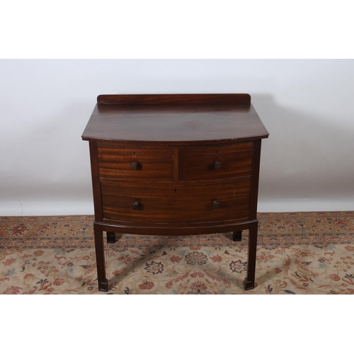 648 - A MAHOGANY CHEST of demilune outline the shaped top above two short and one long drawer on faceted l... 