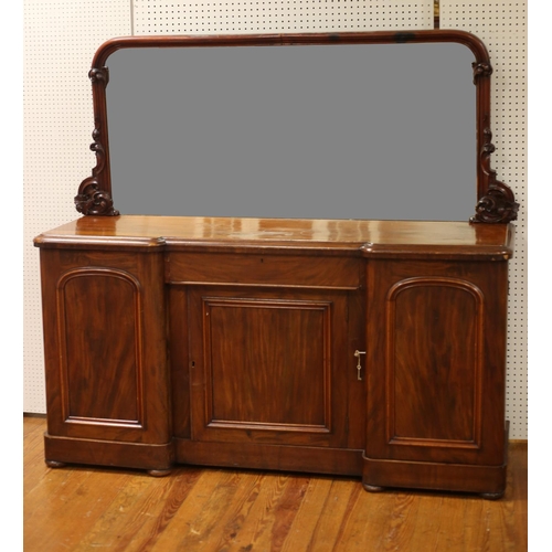 67 - A 19TH CENTURY MAHOGANY SIDEBOARD of inverted breakfront outline the mirrored back within a moulded ... 