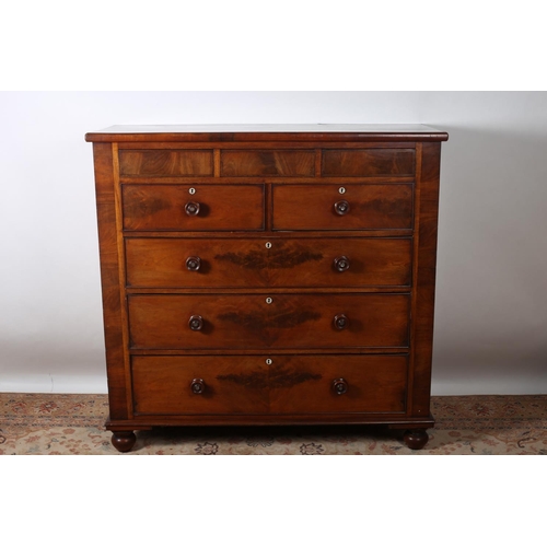 70 - A GOOD 19TH CENTURY MAHOGANY CHEST of rectangular outline with three secret frieze drawers above two... 