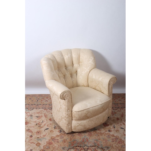 75 - A VICTORIAN DESIGN UPHOLSTERED TUB SHAPED CHAIR with button upholstered back and seat and scroll ove... 